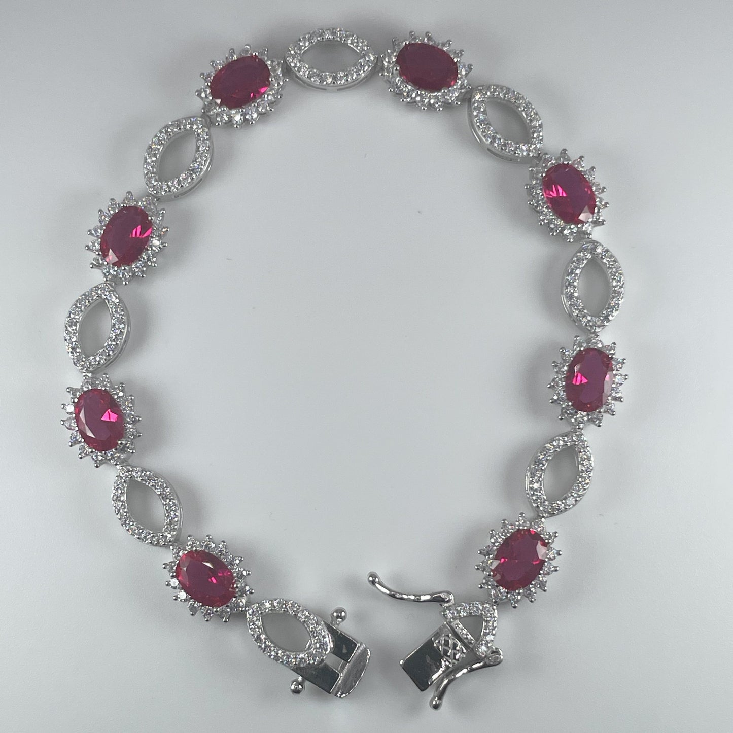 0.925 Sterling Silver 7" Bracelet with Clear and Red Cubic Zirconia