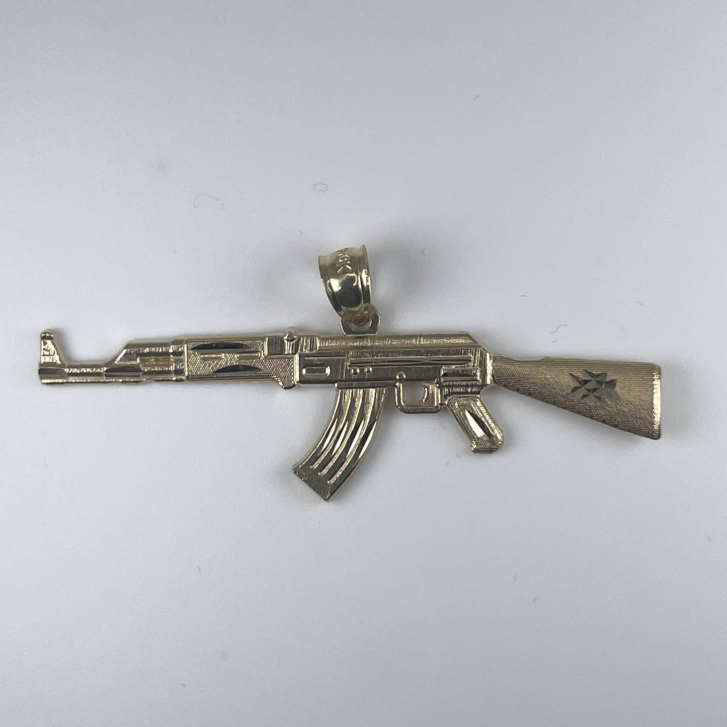 10k Gold 2gm Gun Pendant