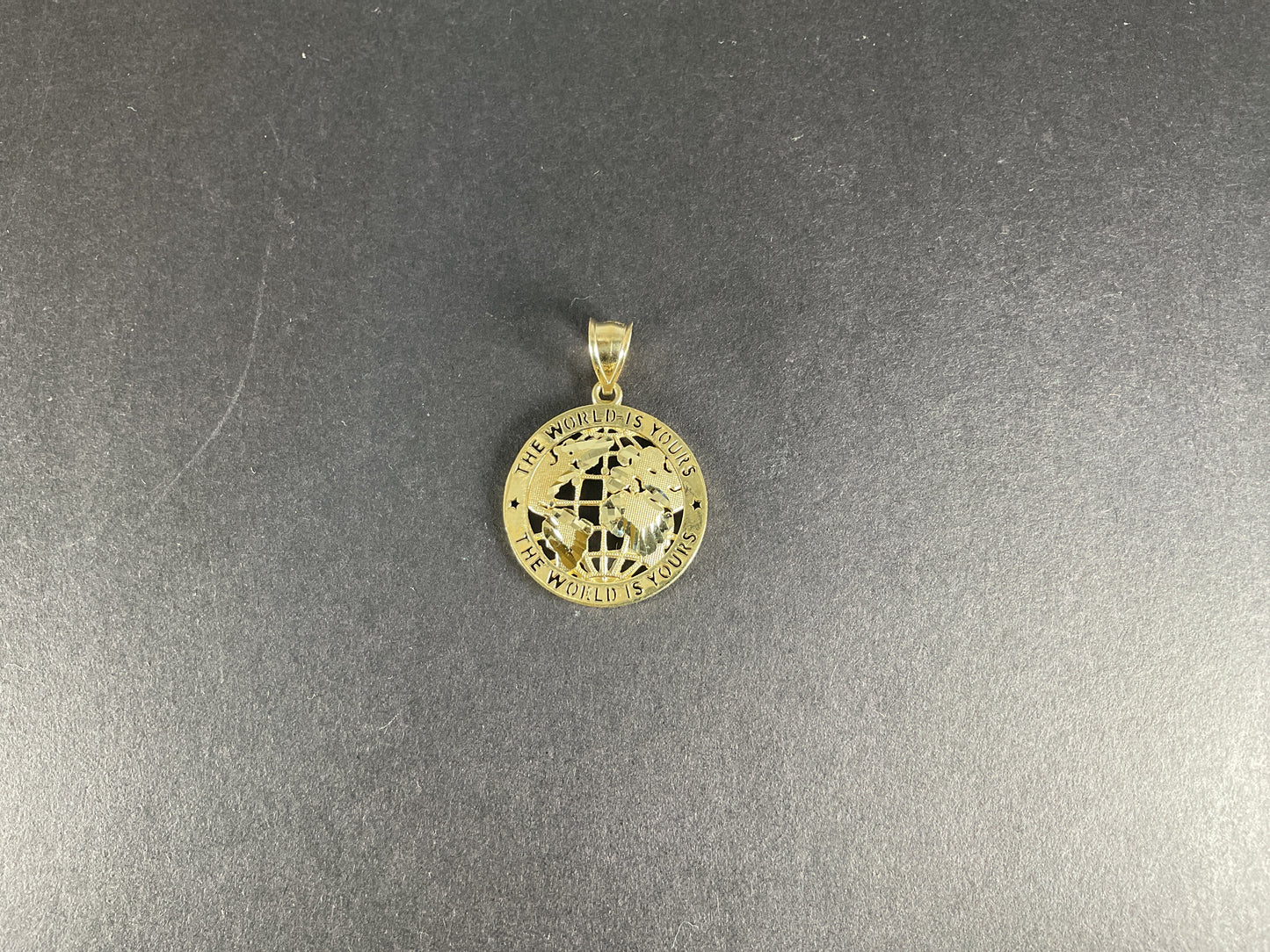 10k The World is Yours Pendant 2.2 gm.