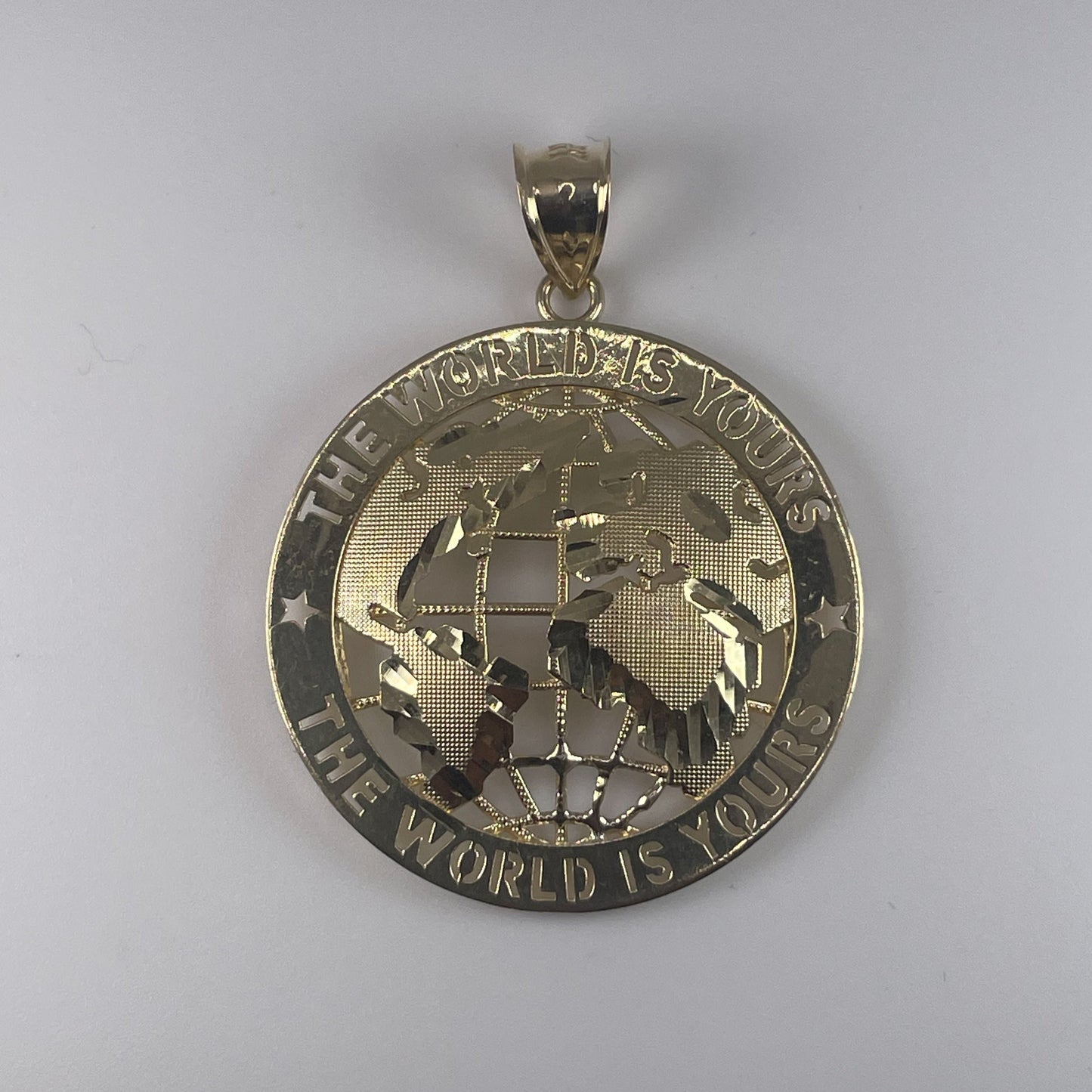 10K Gold 4.3gm The World Is Yours D/Cut Pendant